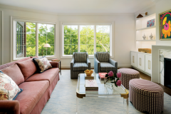 The great room has furnishings from Highland House, with pillow fabric and trim from Casa Branca and Clarence House. The rug is by Stark.